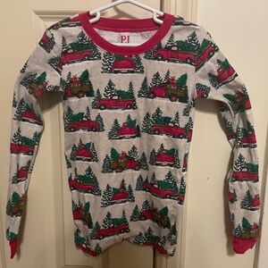 2 Christmas themed pajamas. Hanna Anderson Star Wars and The Child Place.Size 10